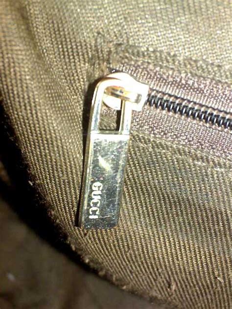 fake gucci zipper pulls|Gucci handbag zipper.